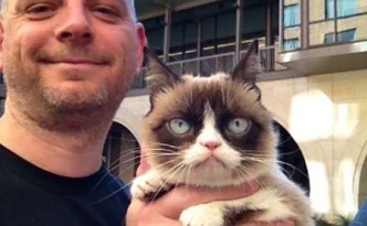 I let Grumpy Cat have her picture taken with me.