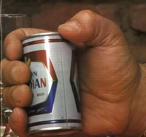 Andre the Giant holding a beer.